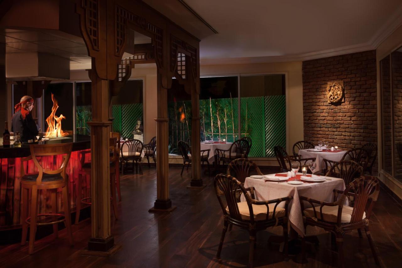 Jolie Ville Hotel & Spa Kings Island Louxor Extérieur photo The interior of the restaurant