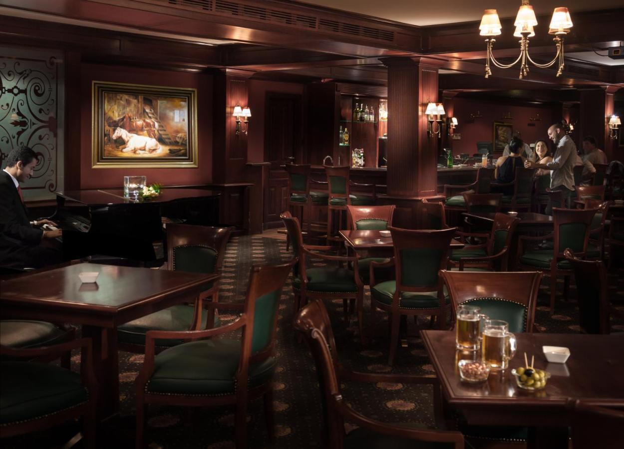 Jolie Ville Hotel & Spa Kings Island Louxor Extérieur photo The interior of the bar